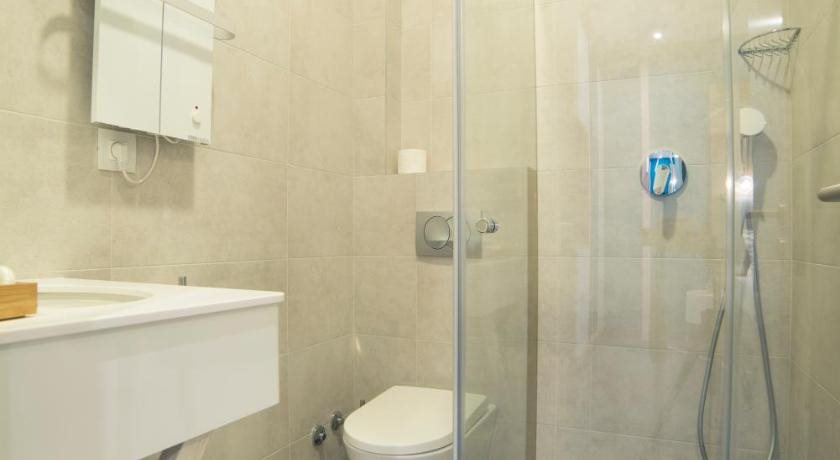 City Nest Modern & Cozy Suites 16