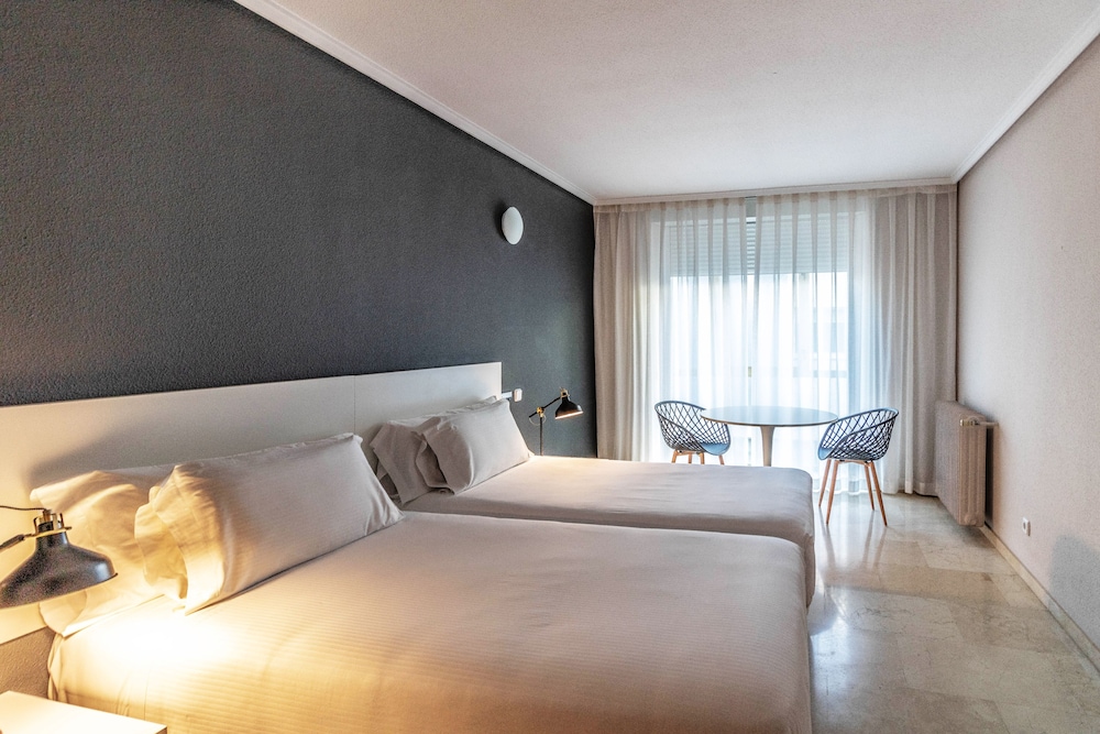 Sercotel Esentia Togumar 7