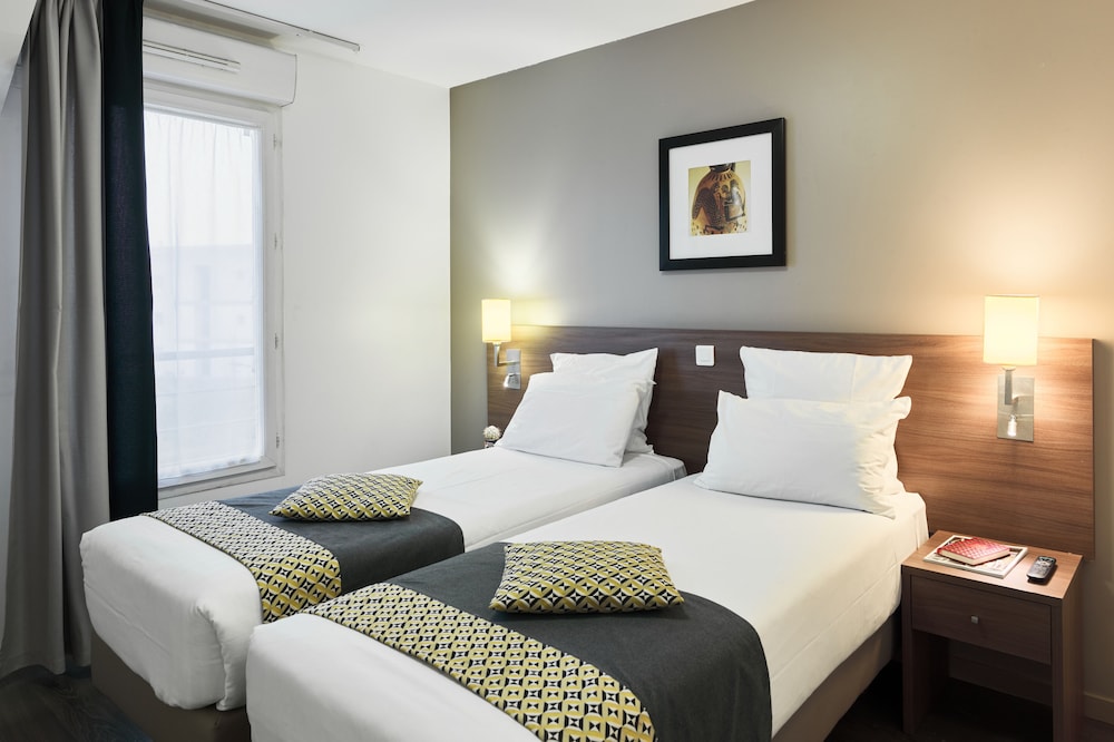 Zenitude Hôtel Résidences Roissy Village 6