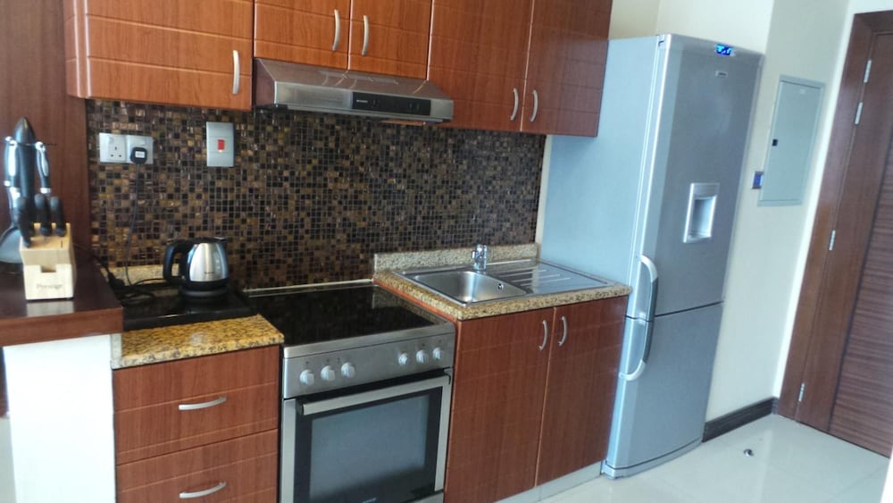 Xclusive Maples Hotel Apartments 8