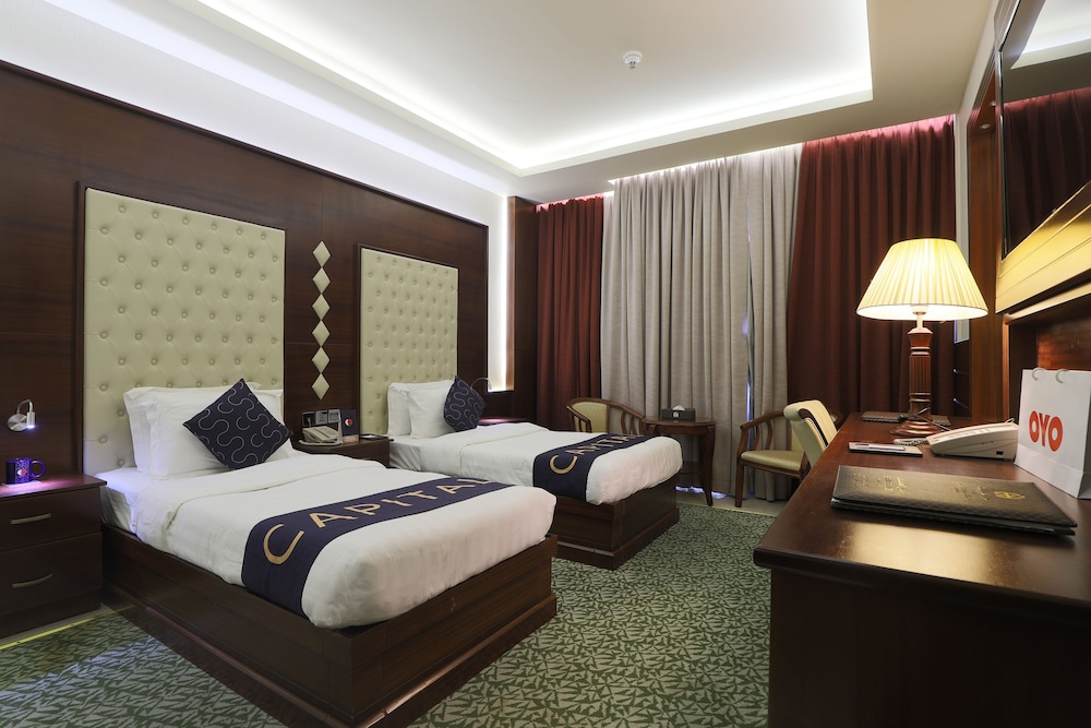 Capital O 325 Queen Palace Hotel 13
