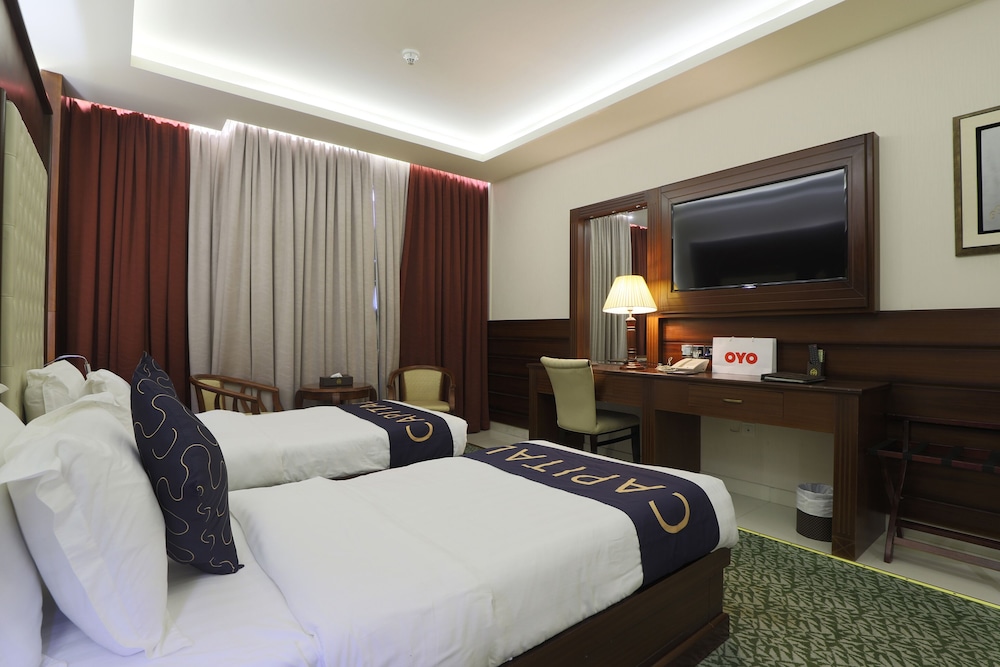 Capital O 325 Queen Palace Hotel 12