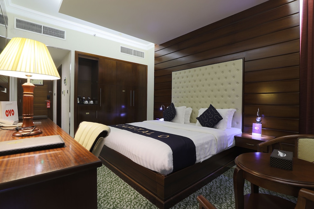 Capital O 325 Queen Palace Hotel 9