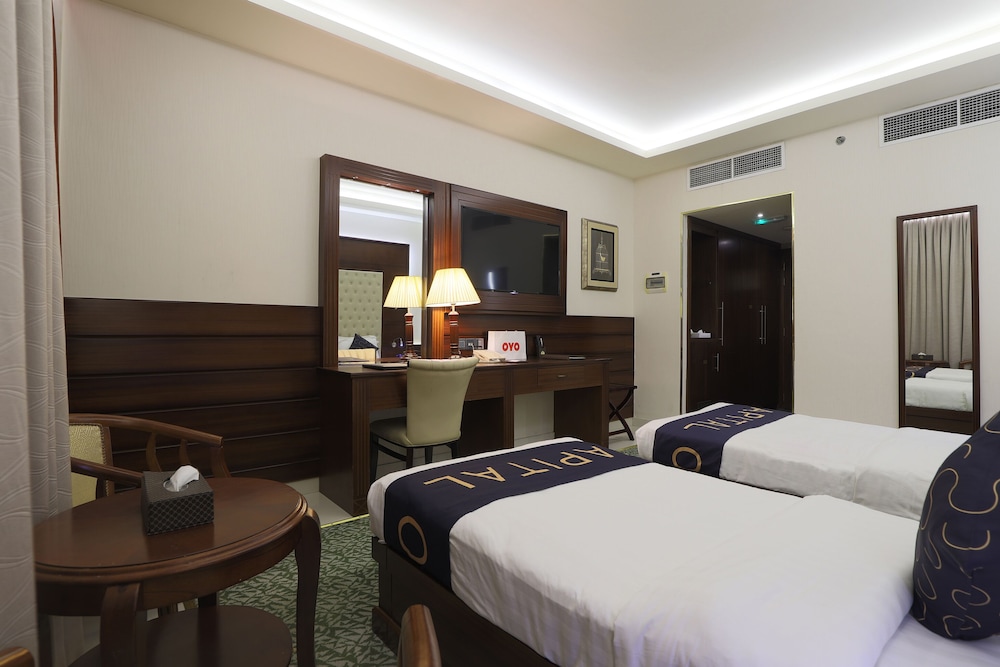 Capital O 325 Queen Palace Hotel 11
