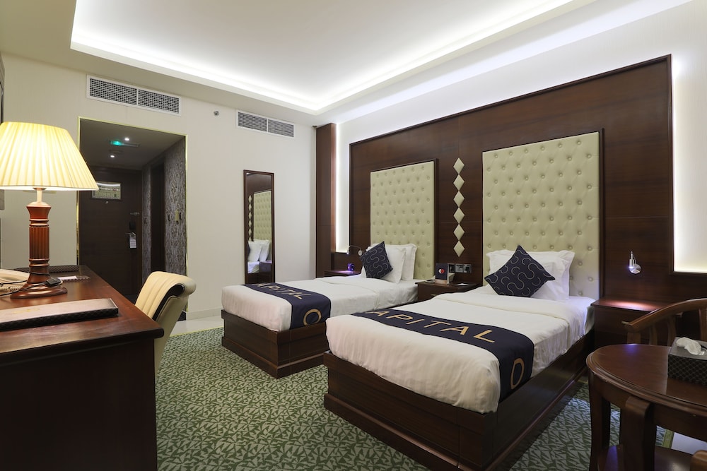 Capital O 325 Queen Palace Hotel 10